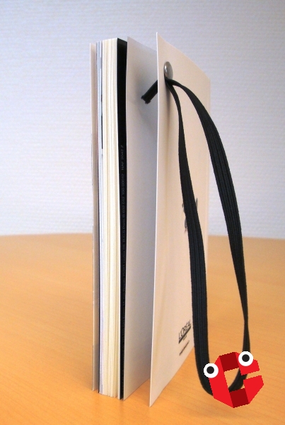 Pose d'élastique sur couverture : Pose d'élastique sur couverture pris dans 1 rivet